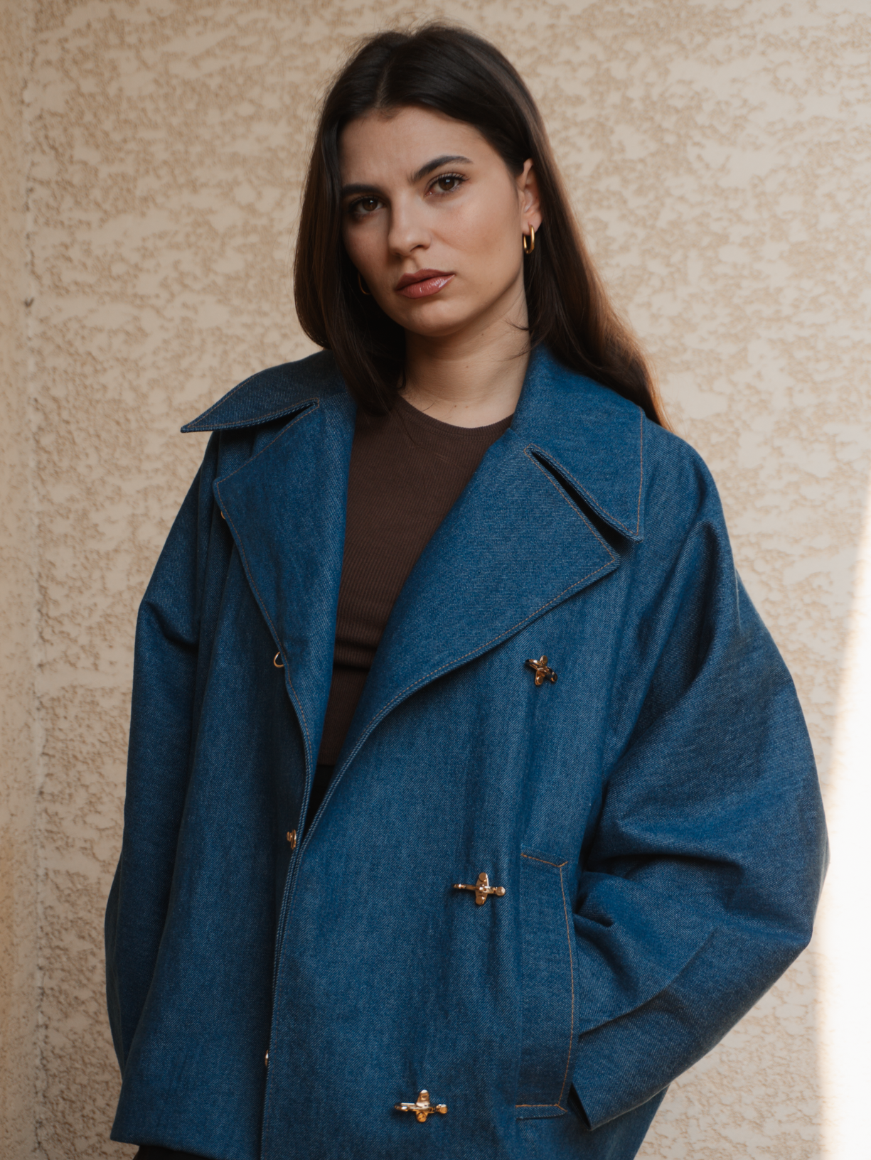 Fermeture boucle manteau