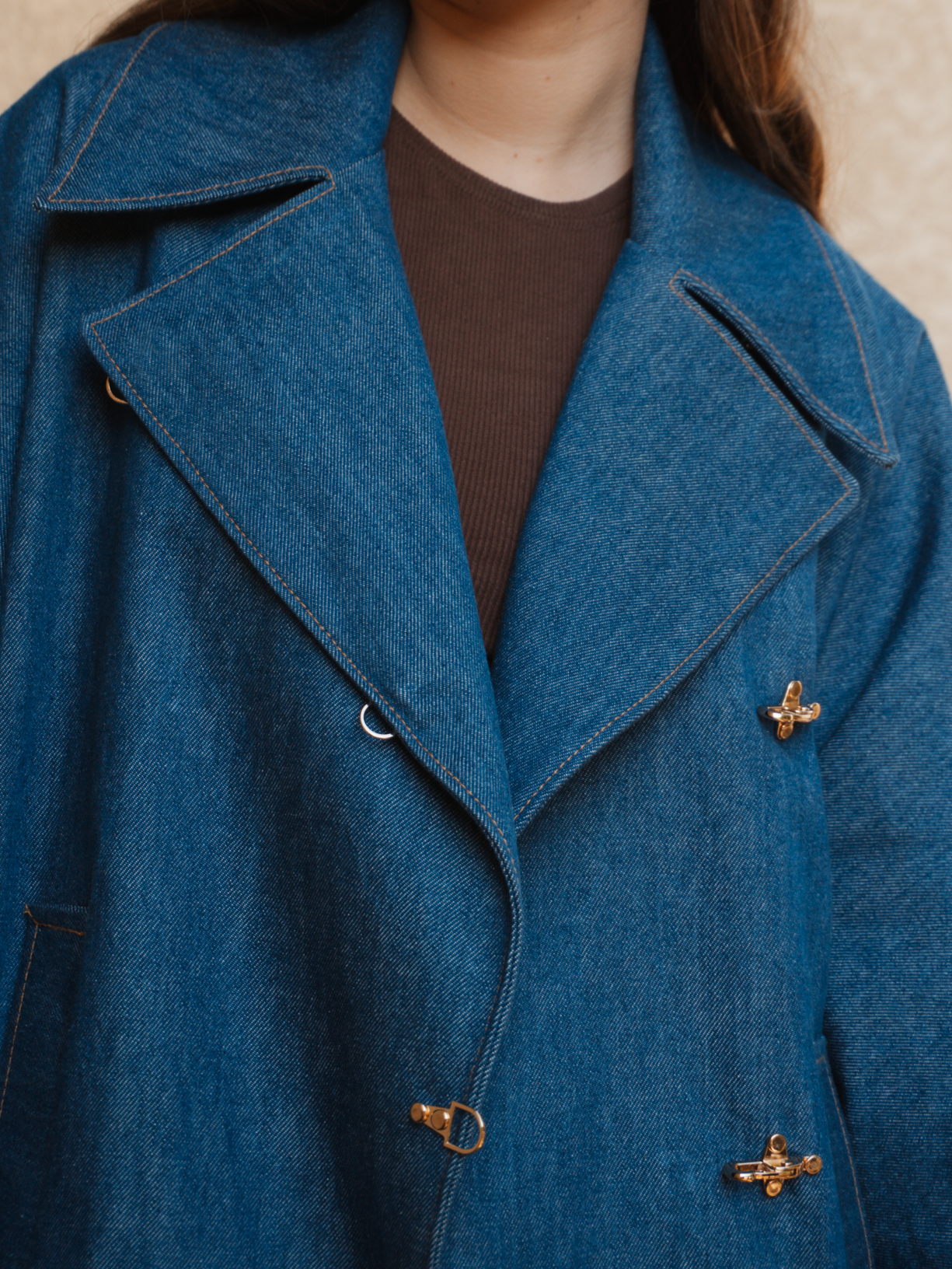 Fermeture boucle manteau